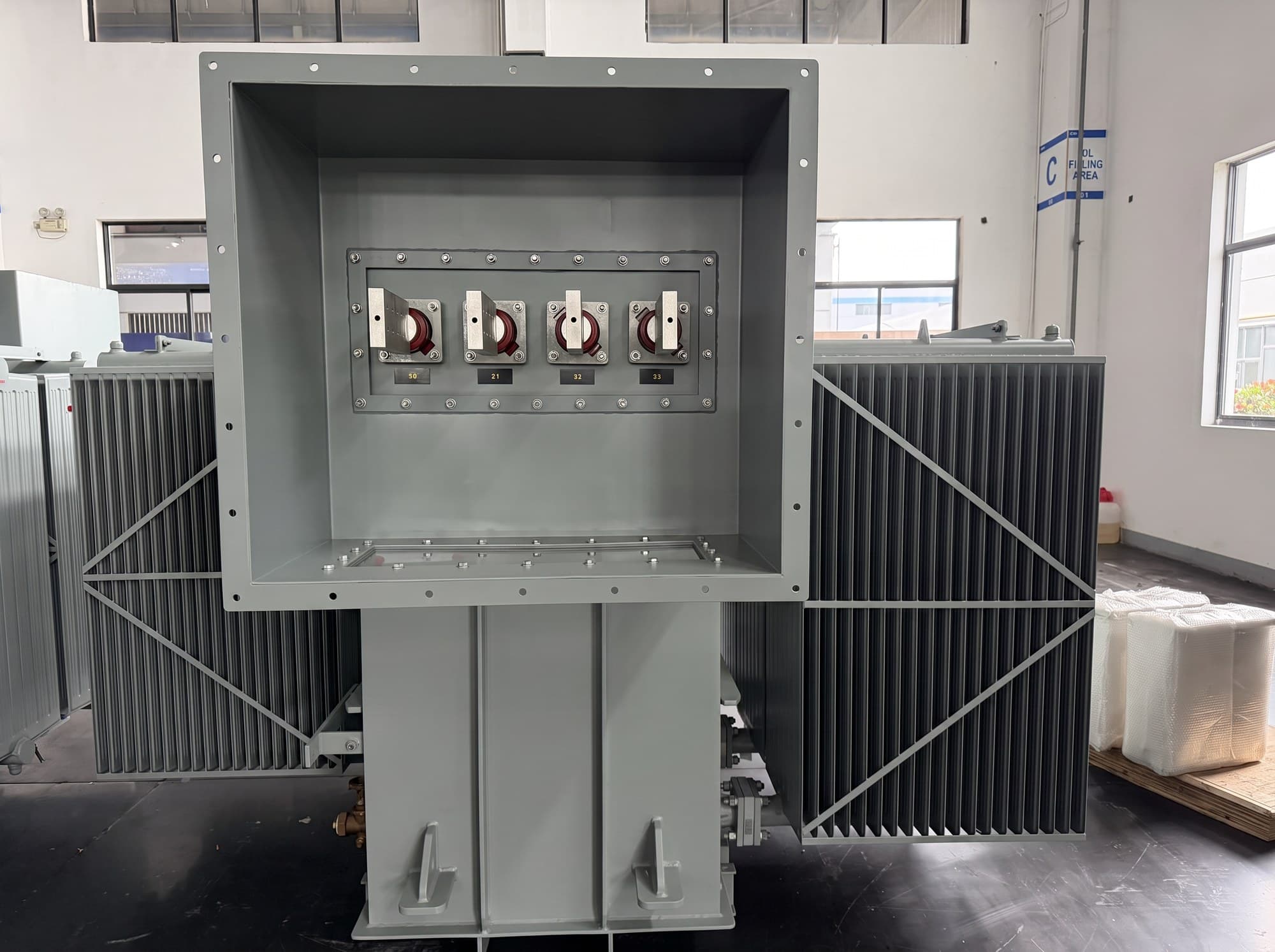 Gauge and control detail on a liquid-filled transformer